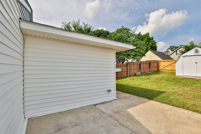 841 Willow Ave, Hamilton, OH 45013 - fenced backyard with a storage shed and a patio