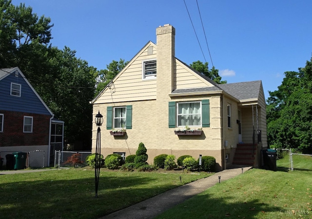 6774 Le Conte Ave, Cincinnati, OH 45230 - view of side of home with a gate, brick siding, a shingled roof, and a chimney