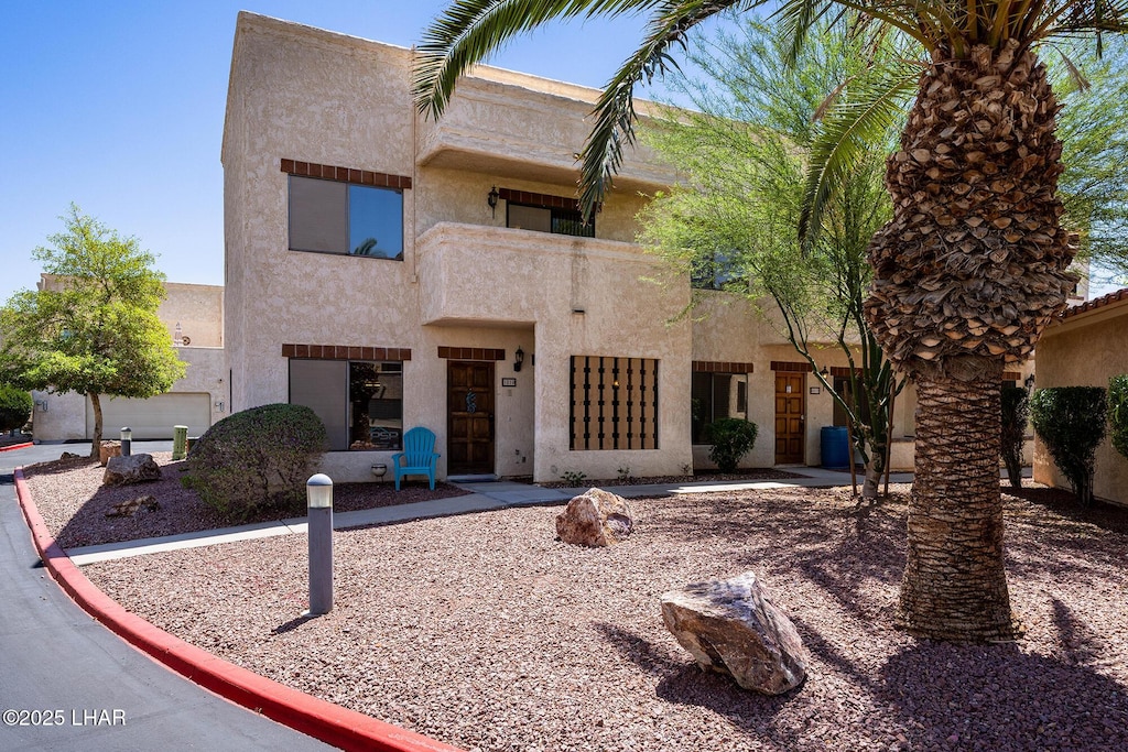 1010 Barcelona Loop, Lake Havasu City, AZ 86403 - view of front facade with stucco siding