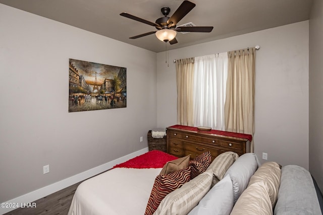 bedroom featuring ceiling fan and hardwood / wood-style floors