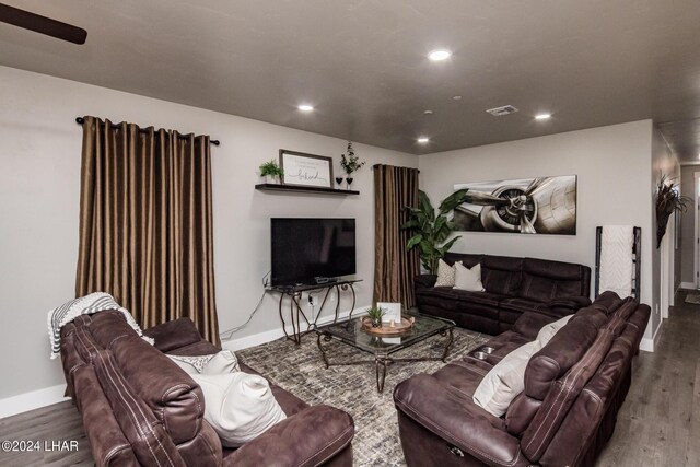 living room featuring dark hardwood / wood-style floors