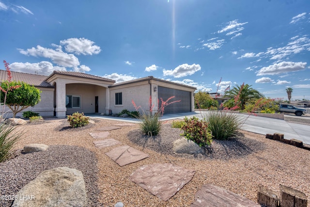 1430 Murphy Dr, Lake Havasu City, AZ 86404 - view of front of house with stucco siding, an attached garage, and a tile roof