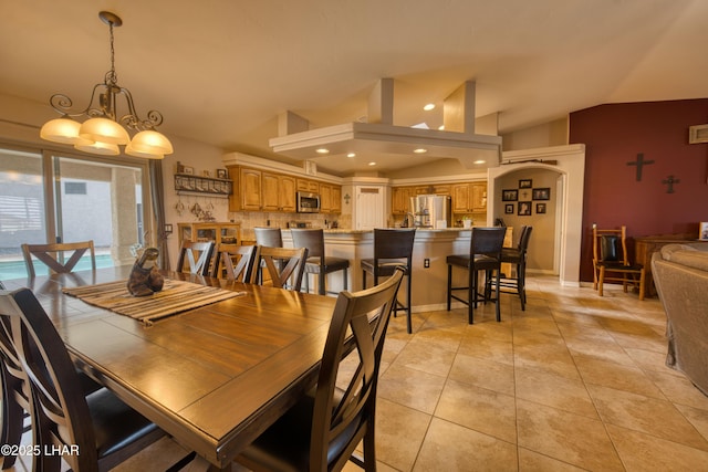 1430 Murphy Dr, Lake Havasu City, AZ 86404 - dining area with vaulted ceiling, a chandelier, recessed lighting, light tile patterned floors, and baseboards