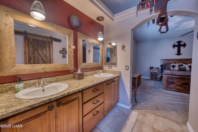 1430 Murphy Dr, Lake Havasu City, AZ 86404 - bathroom featuring double vanity, baseboards, and tile patterned floors