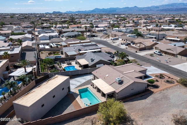 1430 Murphy Dr, Lake Havasu City, AZ 86404 - aerial perspective of suburban area with a pool and a mountainous background
