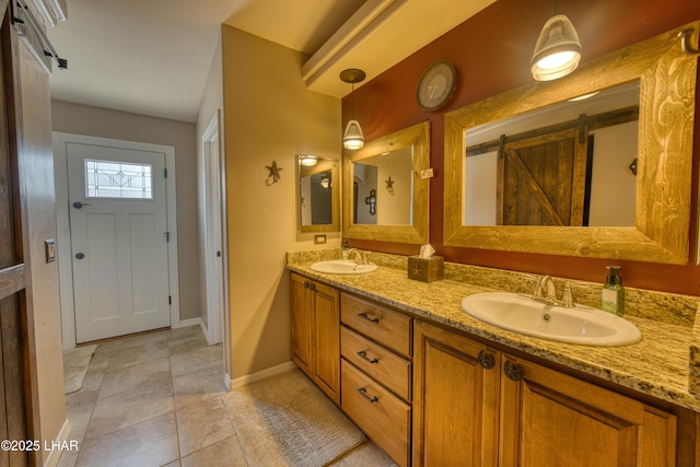 1430 Murphy Dr, Lake Havasu City, AZ 86404 - bathroom featuring double vanity, baseboards, and tile patterned floors