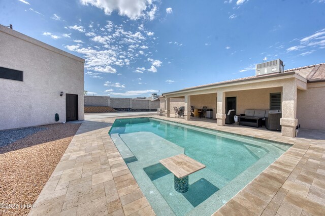 1430 Murphy Dr, Lake Havasu City, AZ 86404 - view of pool featuring a patio, an outdoor hangout area, central air condition unit, and a fenced backyard