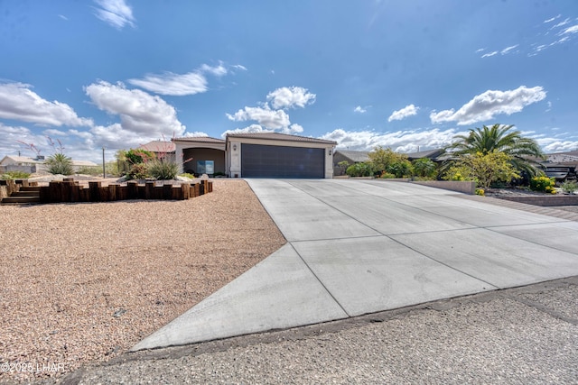 1430 Murphy Dr, Lake Havasu City, AZ 86404 - view of front of property featuring driveway, a garage, and stucco siding