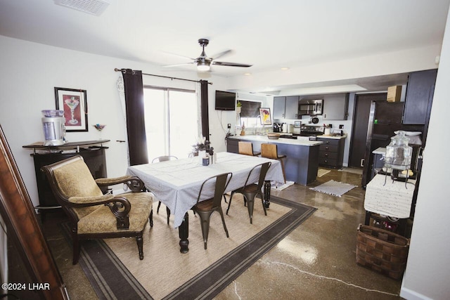 dining room with ceiling fan