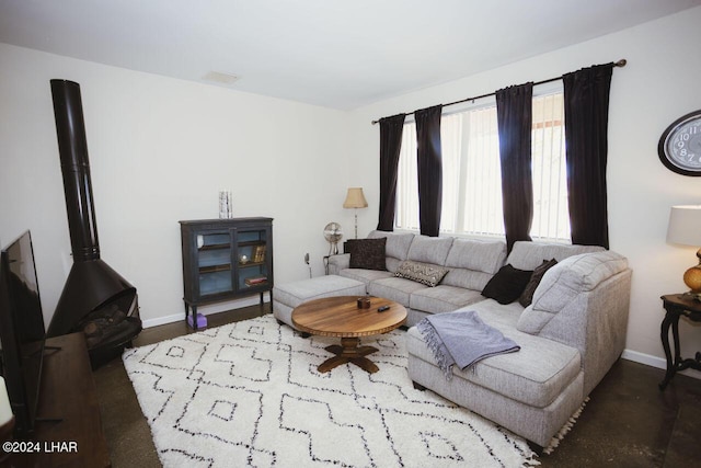 living room featuring a wood stove