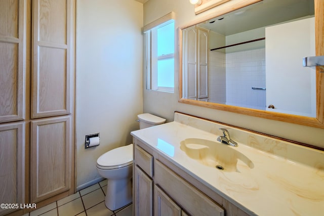 full bathroom featuring vanity, walk in shower, tile patterned flooring, and toilet