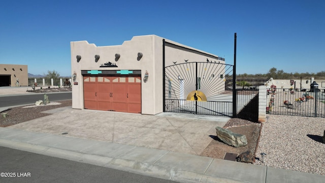 view of gate featuring fence