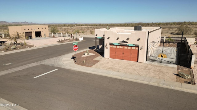 exterior space featuring a gate