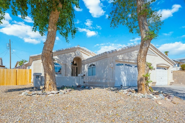 view of front of property featuring a garage