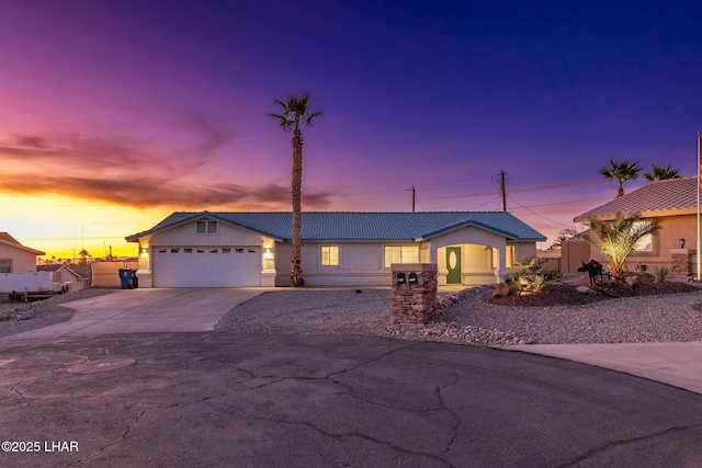 single story home featuring a garage