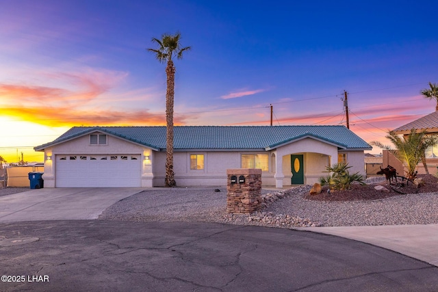 single story home featuring a garage