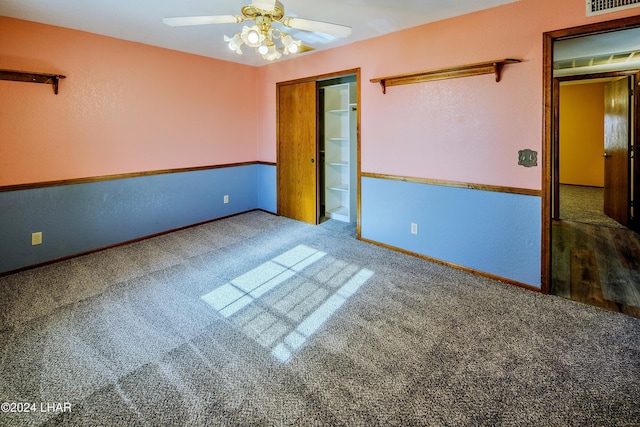 empty room with carpet floors and ceiling fan