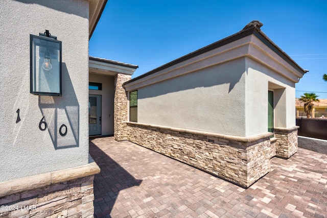 view of home's exterior featuring a patio area