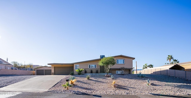 view of front of home with a garage