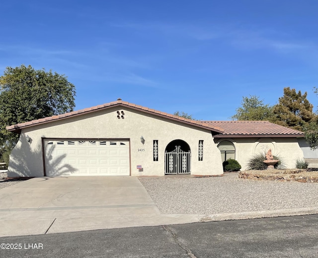 view of front of home with a garage