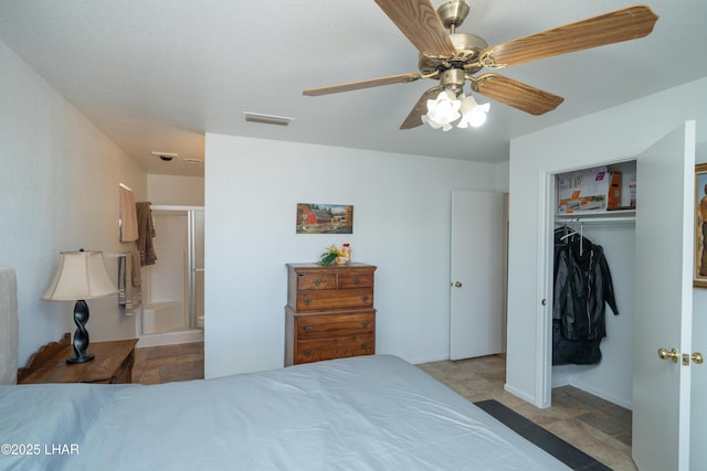 37339 Buckskin Cir, Parker, AZ 85344 - bedroom with a closet, ceiling fan, and connected bathroom