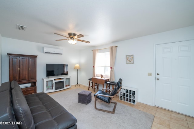 37339 Buckskin Cir, Parker, AZ 85344 - living room featuring a wall unit AC, a ceiling fan, and light tile patterned floors
