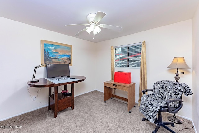 office with light carpet, baseboards, and a ceiling fan