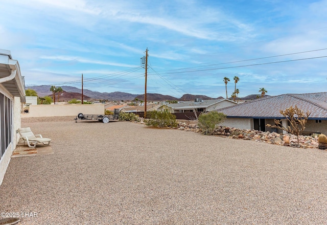 view of yard with a mountain view