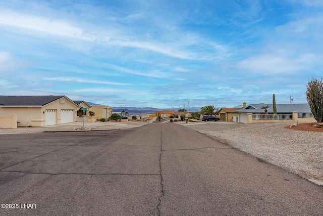 view of road with a residential view