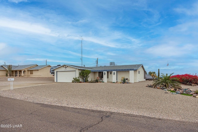 view of front of house with driveway and an attached garage