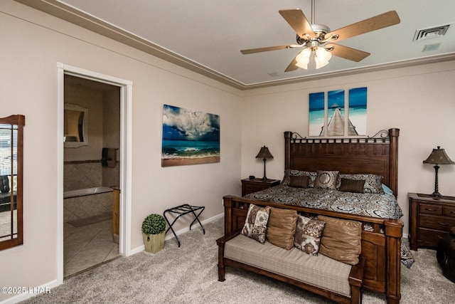 bedroom featuring ensuite bathroom, carpet floors, a ceiling fan, baseboards, and crown molding