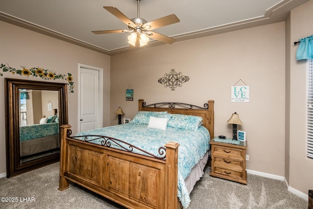 bedroom featuring carpet, baseboards, and ceiling fan