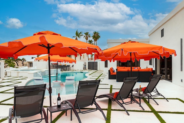 view of patio / terrace with an outdoor pool