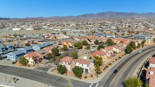 aerial view featuring a residential view and a mountain view