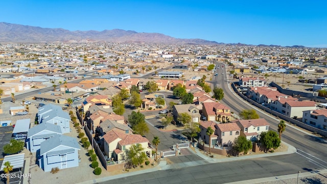 drone / aerial view with a residential view and a mountain view