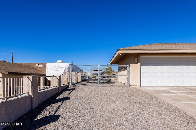 view of yard featuring a garage