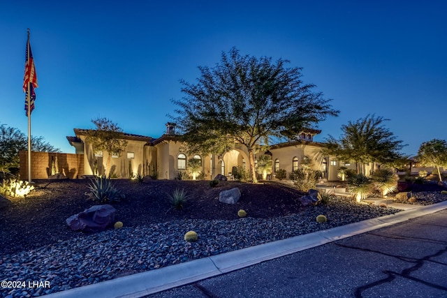 mediterranean / spanish house with stucco siding