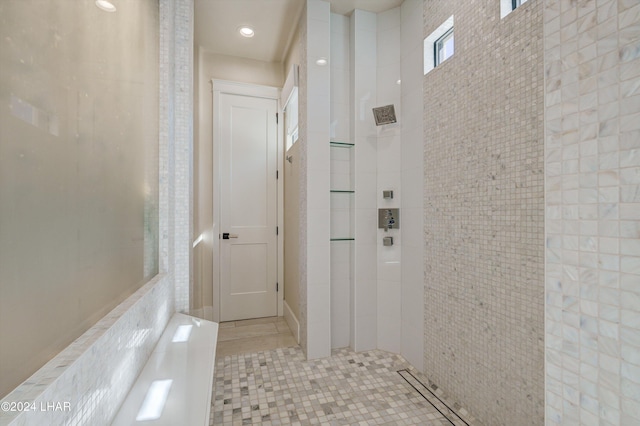 corridor featuring light tile patterned floors