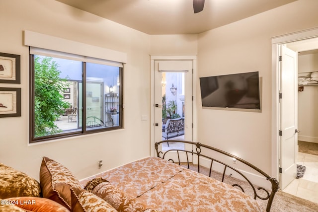 bedroom featuring baseboards and a ceiling fan