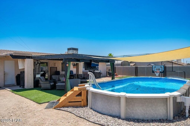 view of swimming pool featuring a fenced in pool, central AC, a patio, and fence