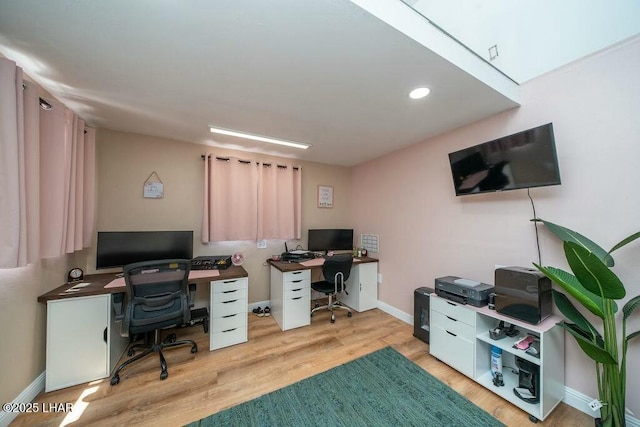 office with wood finished floors and baseboards