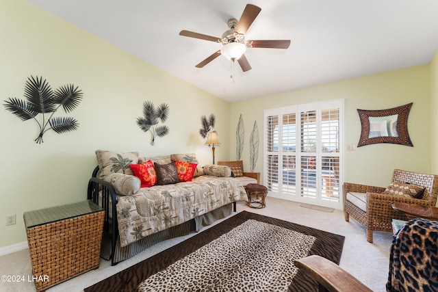 bedroom with ceiling fan, access to exterior, and light colored carpet