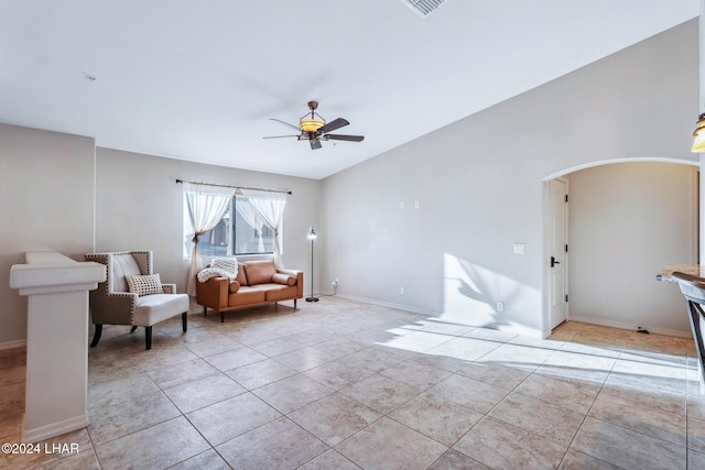 unfurnished room featuring light tile patterned floors and ceiling fan