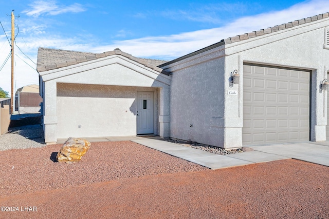 ranch-style house with a garage