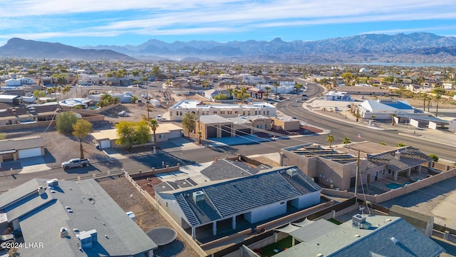 birds eye view of property featuring a mountain view