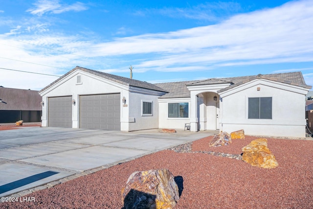 ranch-style house with a garage