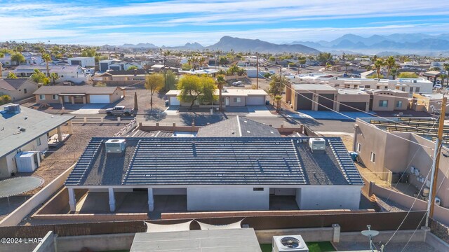 drone / aerial view featuring a mountain view