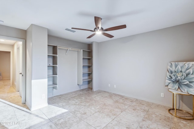 unfurnished bedroom with a closet and ceiling fan