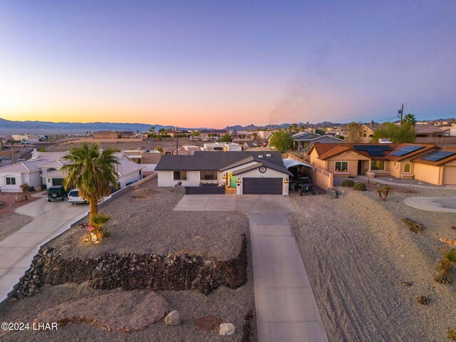 view of front of home with a garage