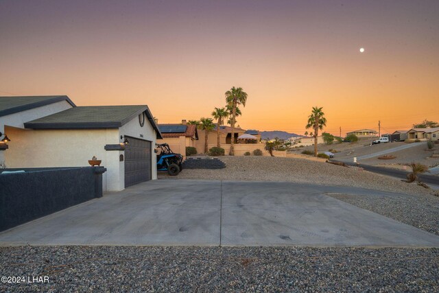 exterior space with a garage